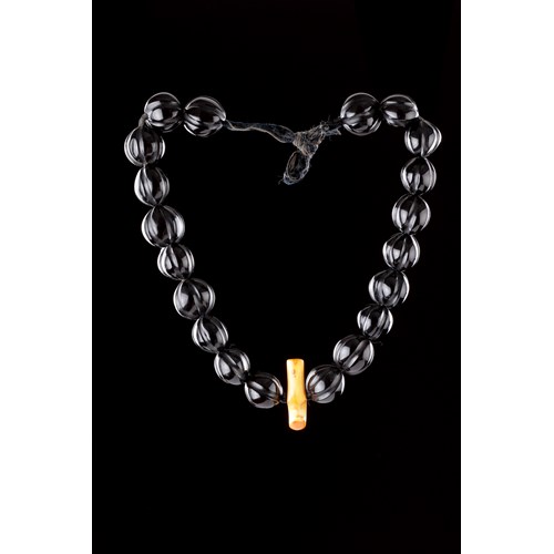 A Very Rare Hawaiian Necklace Black Seed Bead and Whale Tooth Necklace ‘Lei Niho Palaoa’